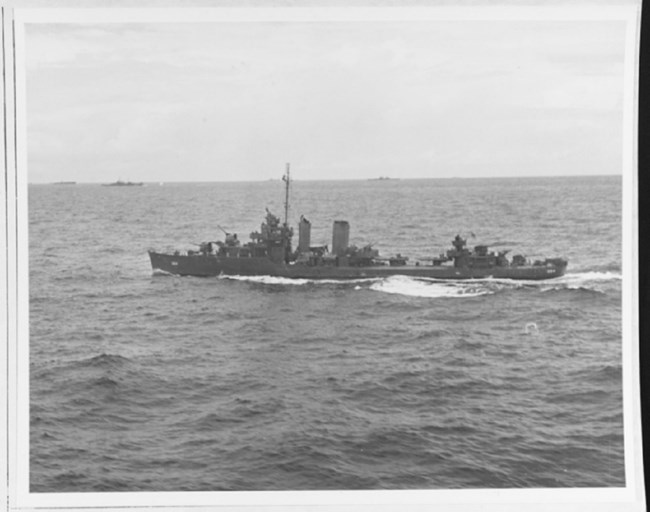 black and white photo of ship at sea