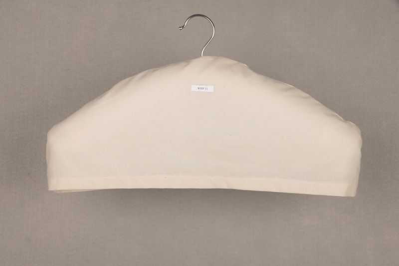 Muslin cover on a padded hanger.