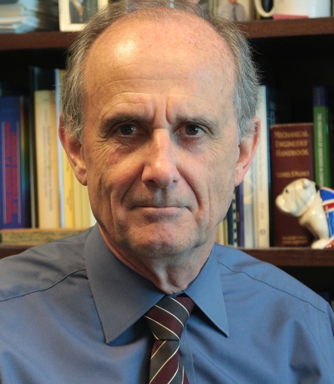 Portrait photo of Dr. Stuart Croll, North Dakota University.