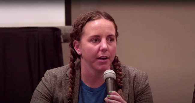 Panelist Jenny Burden answers a question about community engagement.