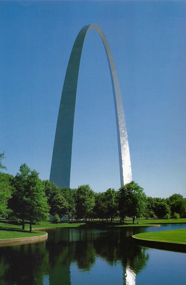 The Gateway Arch, a large steel monumental structure dominating St. Louis.