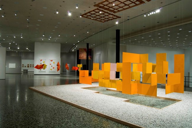 Oiticica Installation at the Museum of Fine Arts Houston. A few suspended three dimensional colorful pieces of art.