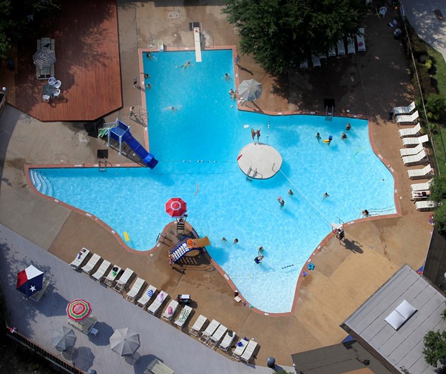 Texas Pool, Plano, Texas Birdseye view of a large swimming pool shaped like the state of Texas.