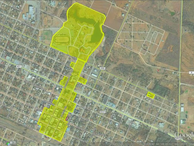 Overhead map of a large contiguous city section and a discontiguous area.