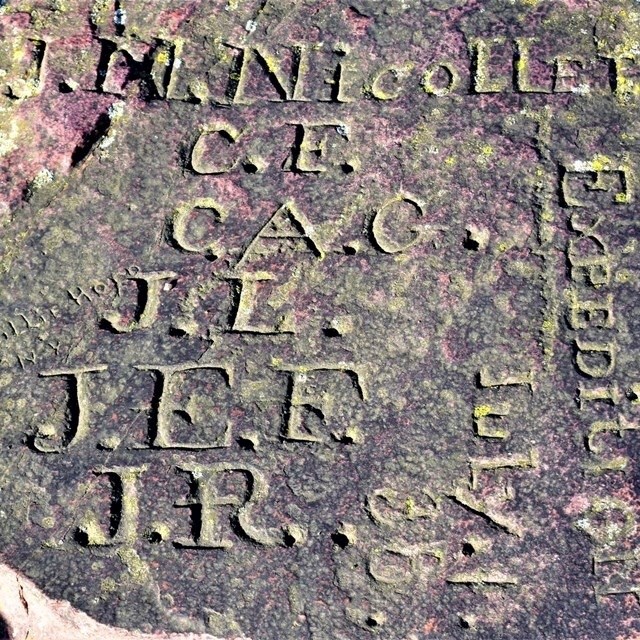 Nicollet Marker Stone with initials carved into it