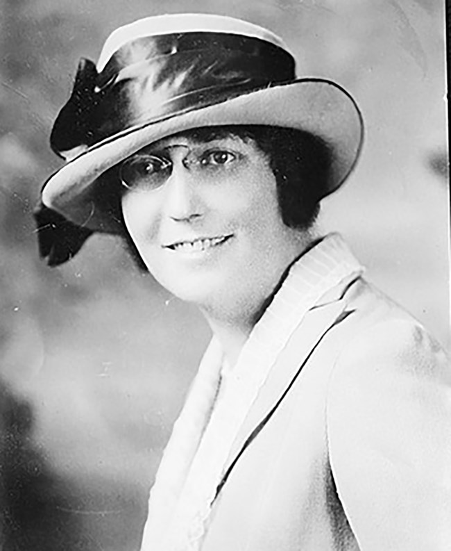 portrait of Nina Otero-Warren wearing a hat