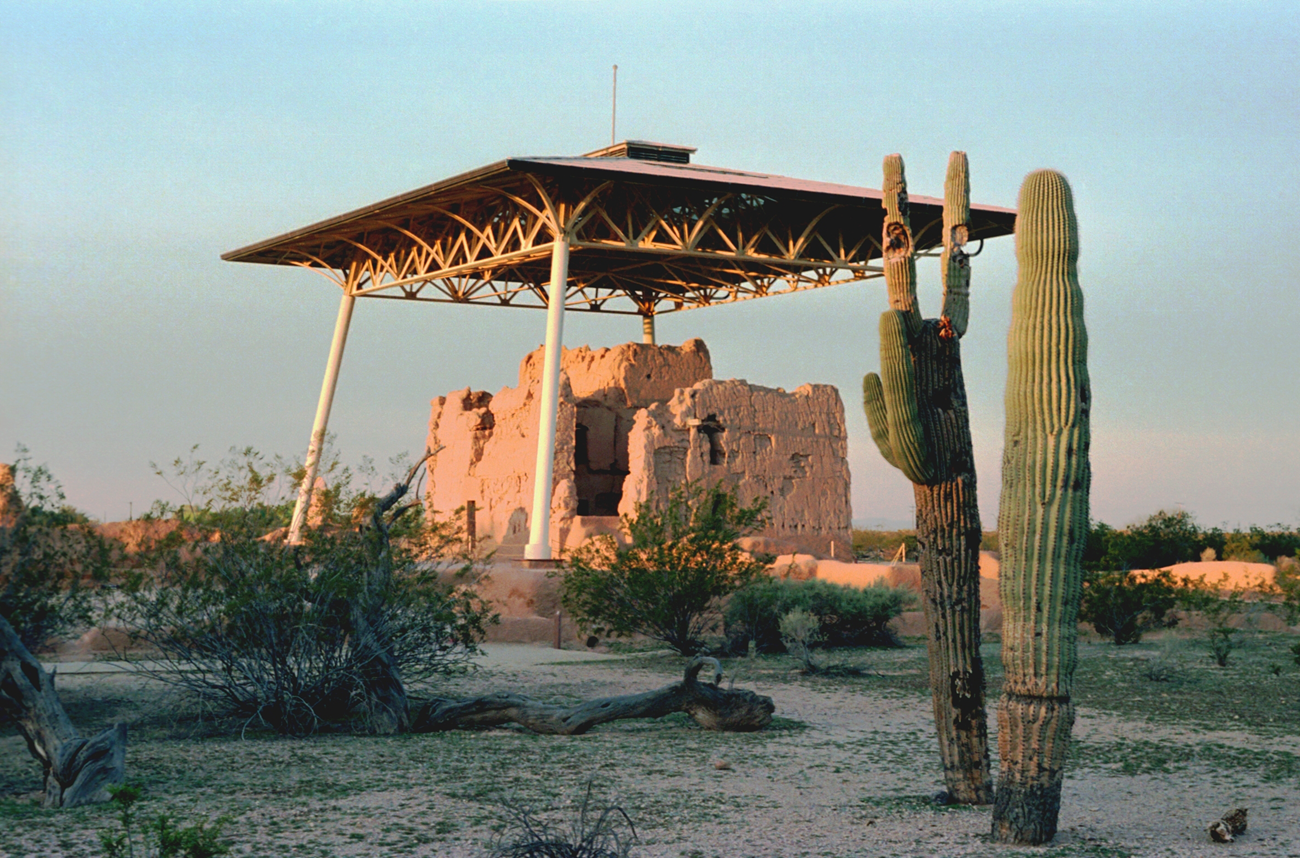 The Casa Grande from the northeast. Ruins of a massive adobe structure with modern roof overhead to protect it.