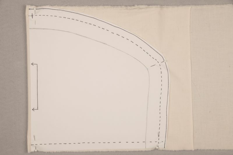 Demonstrate how to pin paper pattern to muslin.