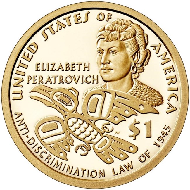 peratrovich 3 a gold coin with a raven emblem, etching of a woman's face and words elizabeth peratrovich anti-discrimination law of 1945