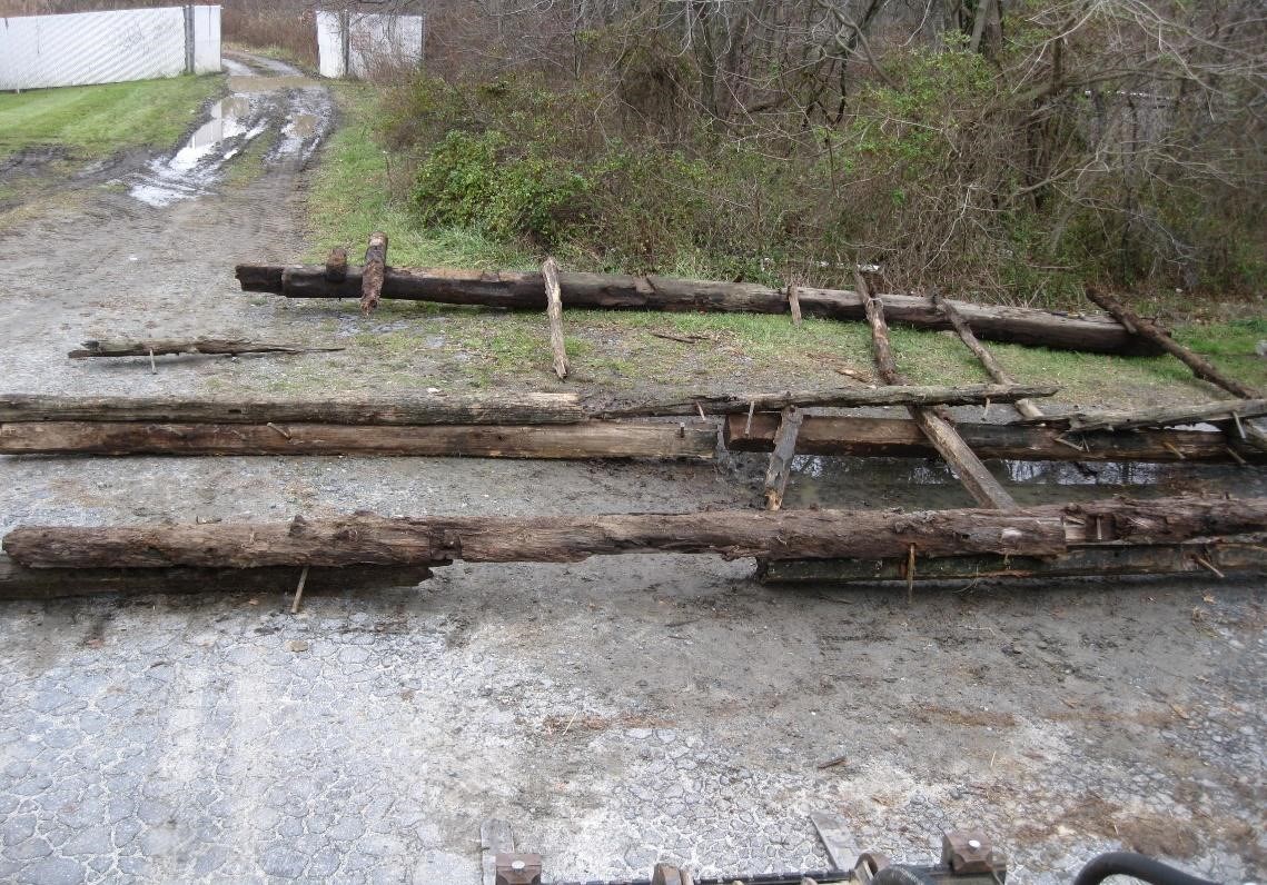 “It’s much more fun to take a dam down than to build it,” Jerry said. The permitting for the dam removal required historic preservation, so the timber dam was documented, preserved and is stored by the University. Photo Credit: Doug Janiec.