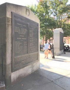 plaques on a granite block