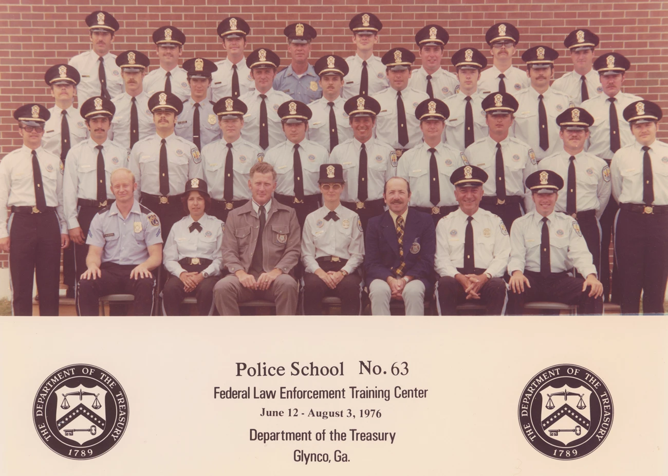 Police School No. 63 Four rows of US Park Police officers, most in uniform, pose for a class photo.