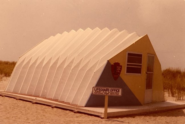 Accordion-looking building on a beach