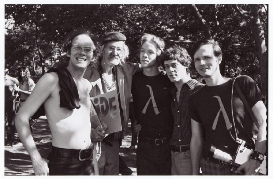 Prescott Townsend with four other young men at a Pride Parade