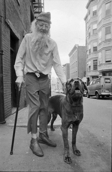 A bearded Prescott Townsend with a dog.