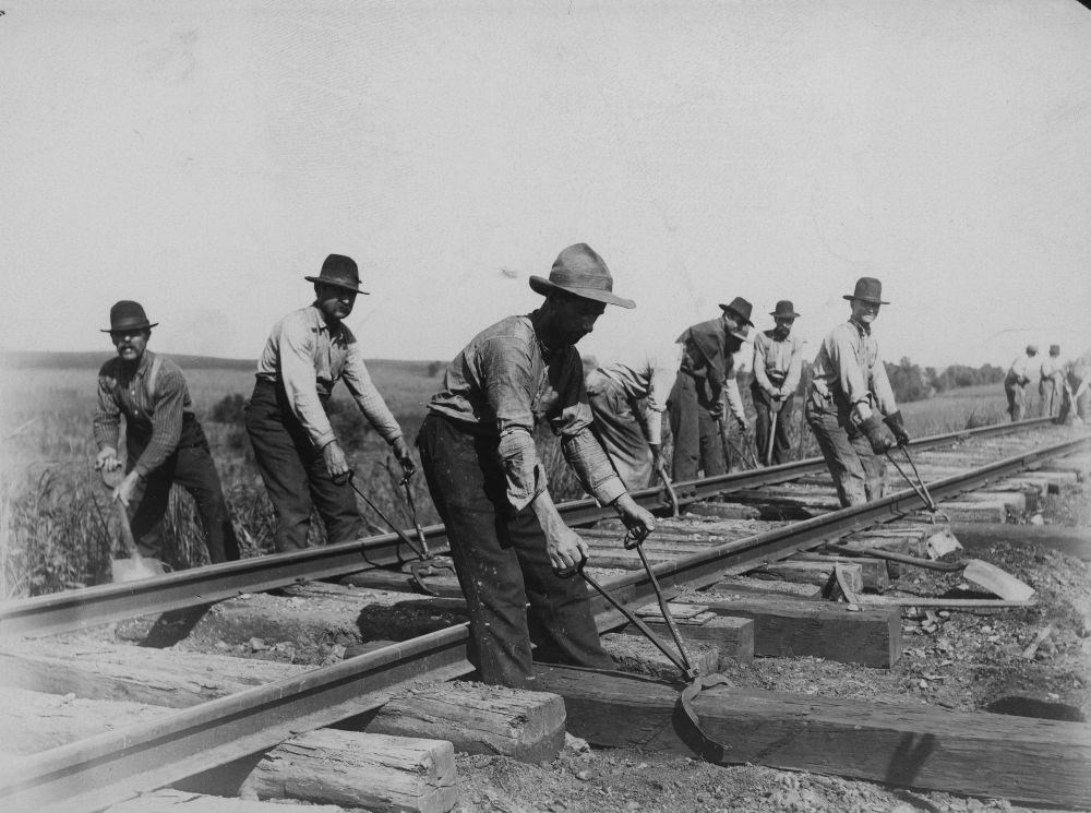 Black and White photo of railroad workers