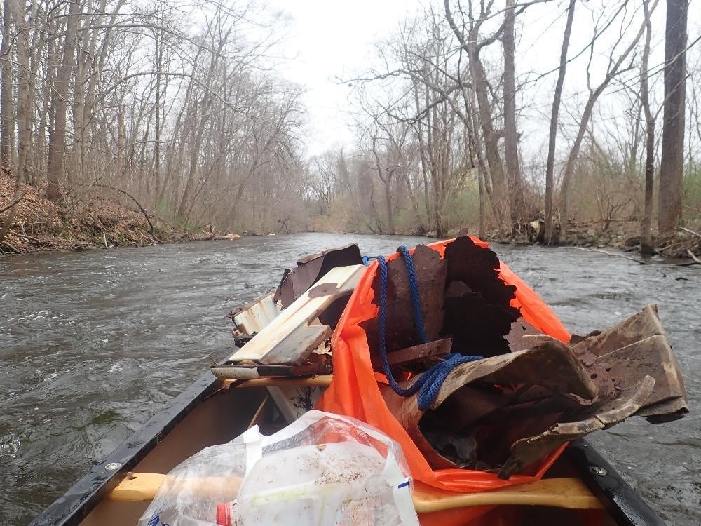 Above: view from the canoe during a Musconetcong river cleanup from 2019. Due to safety concerns amid the current pandemic, a MCC river cleanup was unable to happen this year. Photo courtesy of MCC’s website
