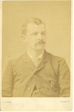 James F. Ryder picture was printed on yellow cardboard of a young man