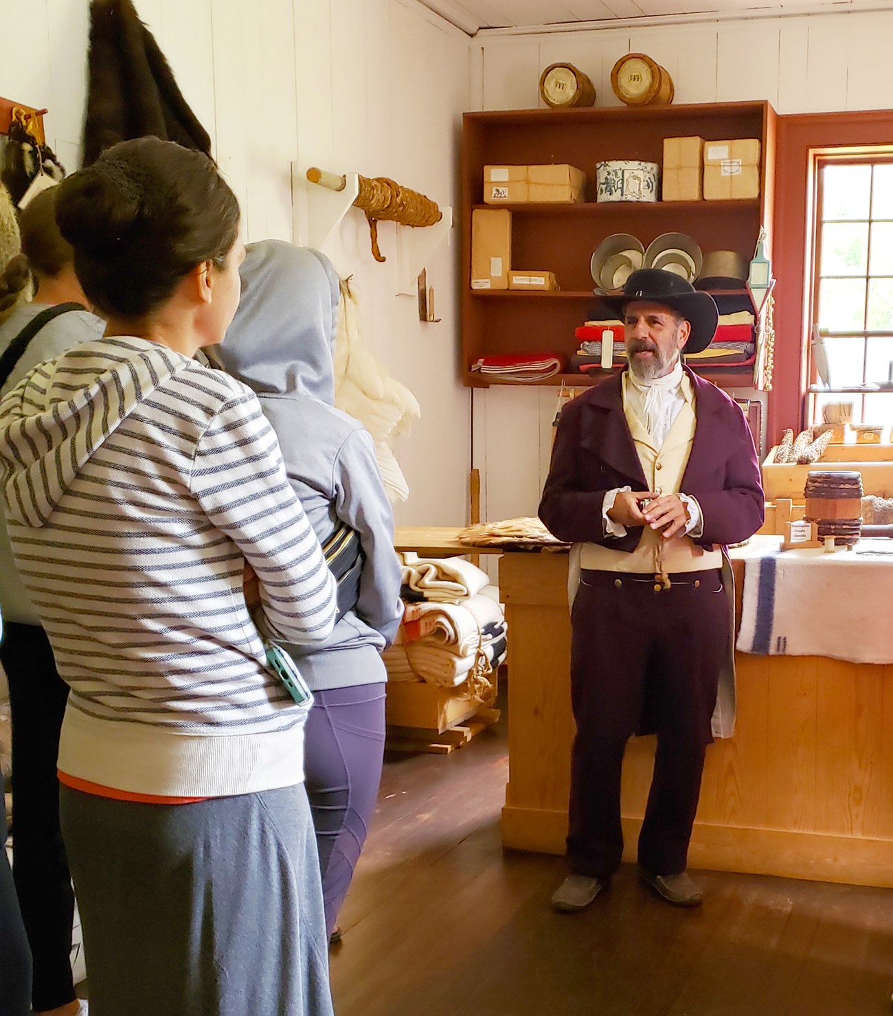 Sam G A person dressed in historic clothing talking to an audience.