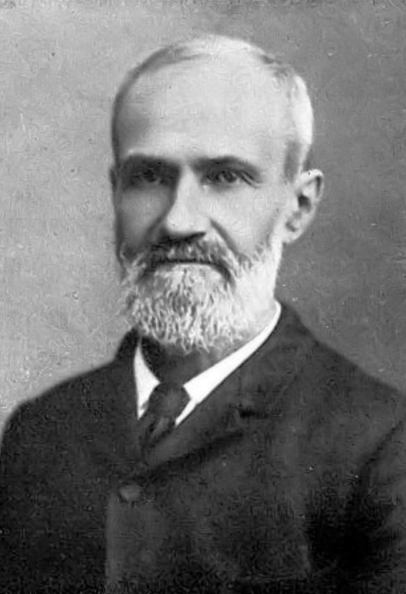 samuel_aughey man with a white beard is wearing a suit jacket
