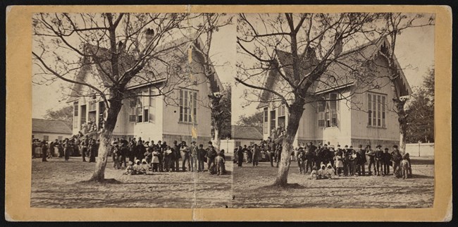 school house Double image of white building students standing undertree