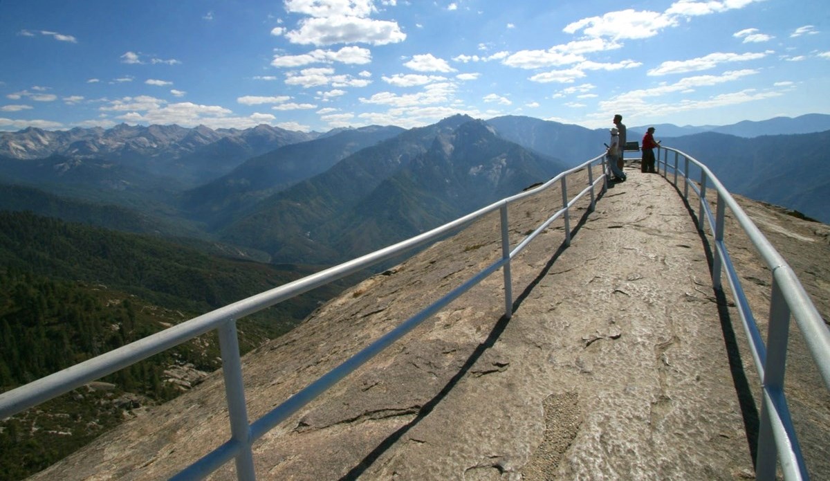 path with handrails across the top of a granite dome