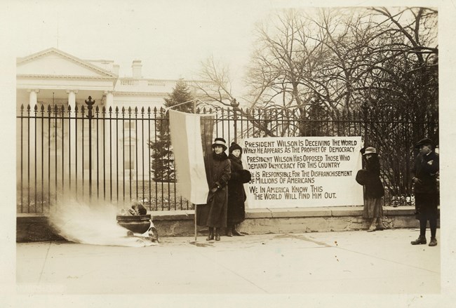Party watchfires burn outside White House, Jan. 1919.