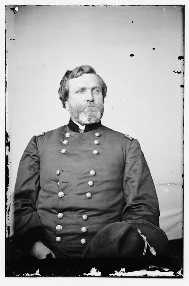 Portrait of Maj. Gen. George H. Thomas, officer of the Federal Army A black and white image of Thomas in uniform sitting.