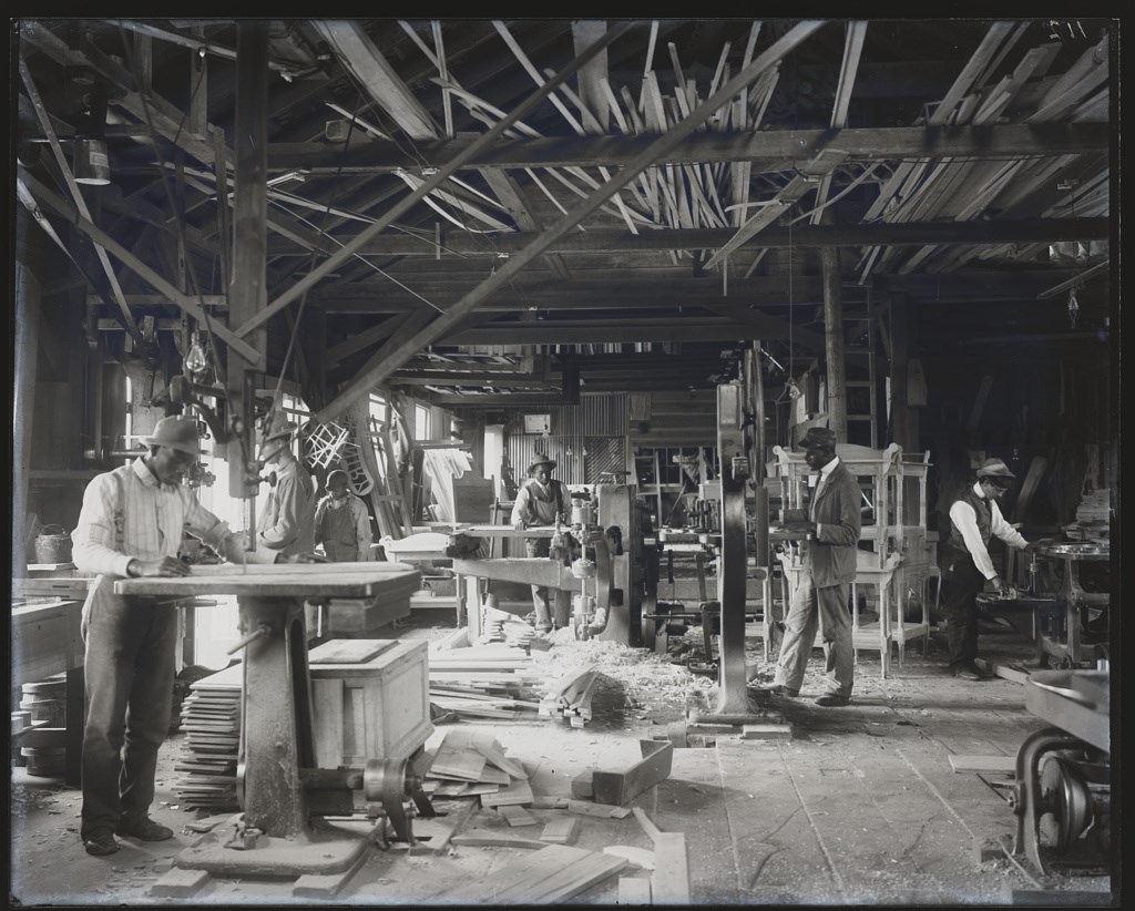 Tuskegee Institute students in a wood workshop, circa 1902.