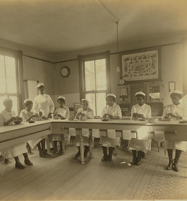 Women learning to cook.