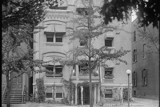 Four-story brick house.