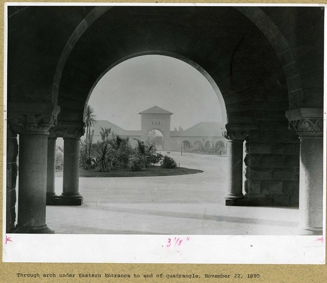 Stanford University Arch black and white image of archway leading down a path