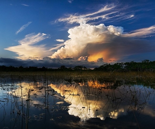 Clouds over water. Public Domain.