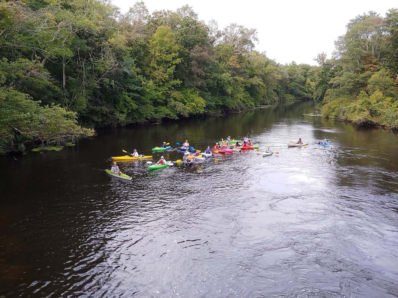 Group of paddlers on the Taunton River by Dick Shafer.