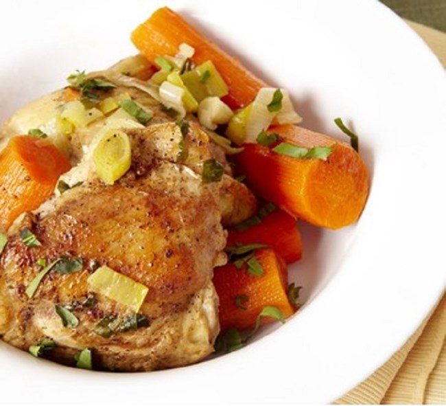 taste of fova chicken Bowl with chicken, carrots, and mashed potatoes.