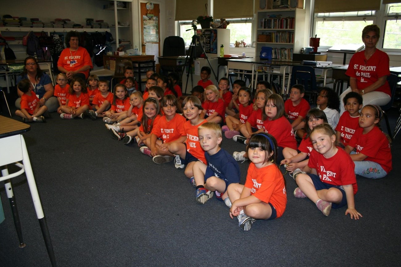 Pre-K and Kindergarten students eagerly waiting for the start of the puppet show. Photo provided by Lynn Maun.