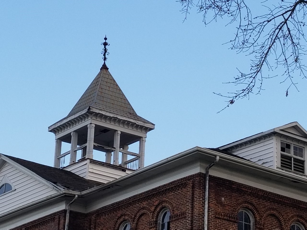 Side view of the original bell tower of Thrasher Hall.