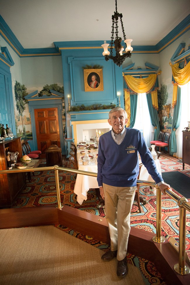 Tom Lonegro Man standing in Hampton mansion dining room. His name is Tom Lonegro.
