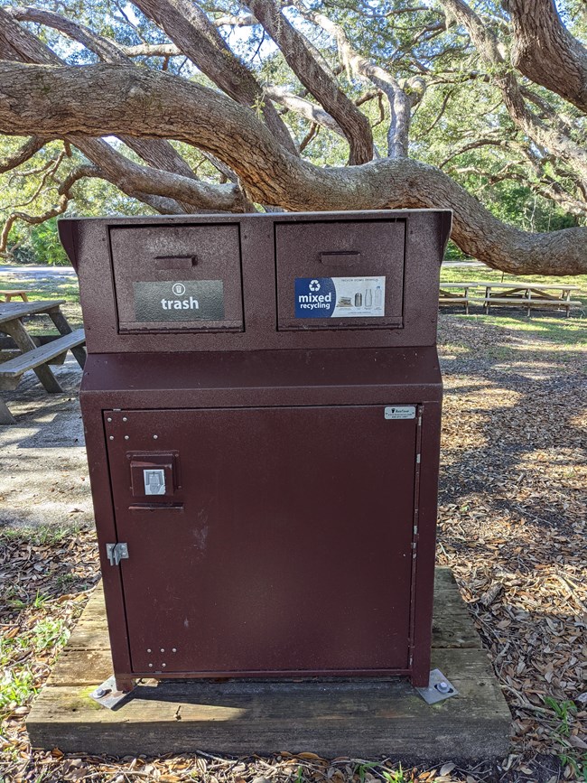 Photograph of a trash and recycle can at Fort Matanzas.