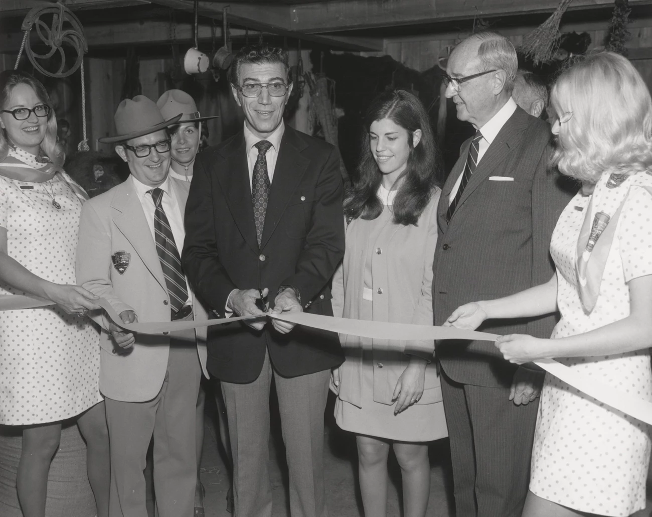Ribbon cutting ceremony Ribbon cutting ceremony with men and women in NPS dress