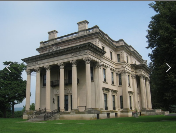 vanderbiltmansionnhs a large mansion that looks like it was made of concrete with pillars in the front