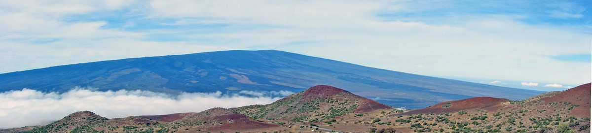 photo of a broad, gently sloping volcanic mountain