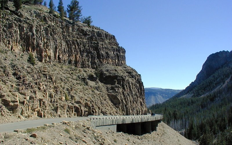 photo of a road side rocky cliff