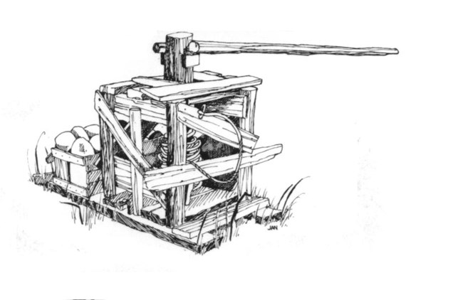 Black and white line drawing of a windlass (winch).