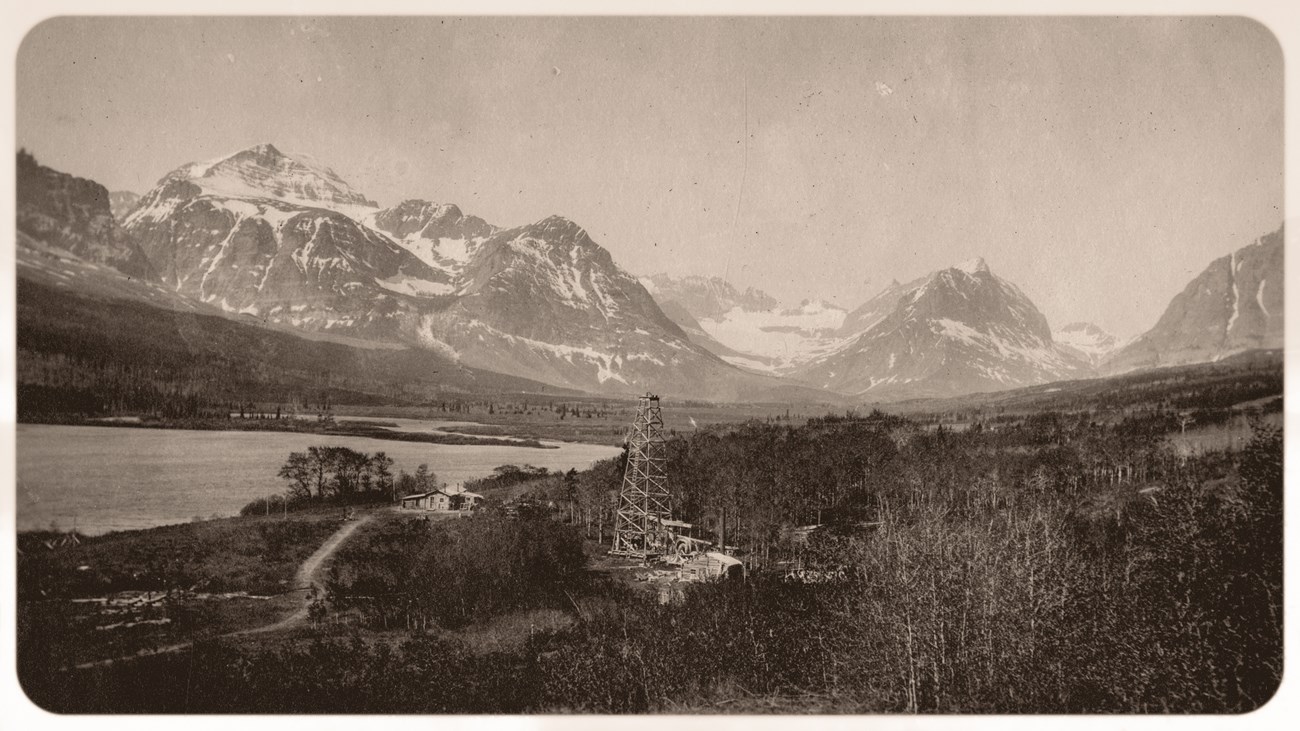 Drilling an oil well by Sherburne Lake with the Many Glacier valley in the background. Drilling an oil well by Sherburne Lake with the Many Glacier valley in the background.