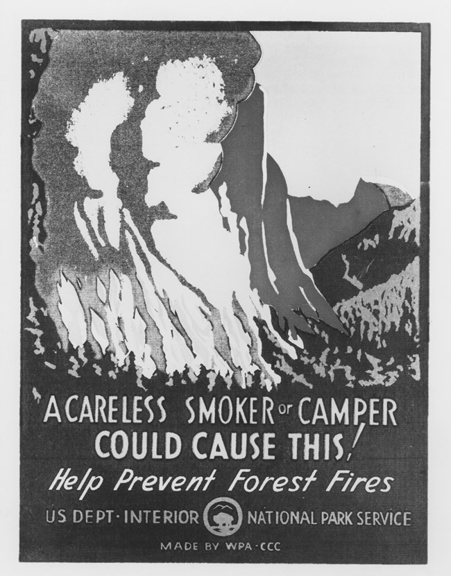 Photo of a poster with smoke in Yosemite warning of smoking danger