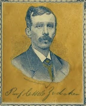 a yellow tinted photo of a man in his 30s who has a mustache