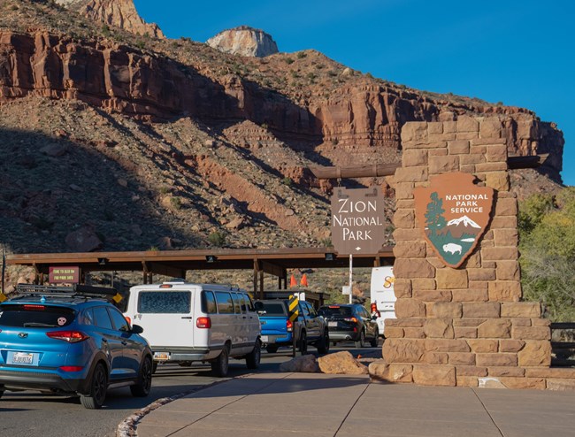 Cars going through the entrance station for Zion National Park