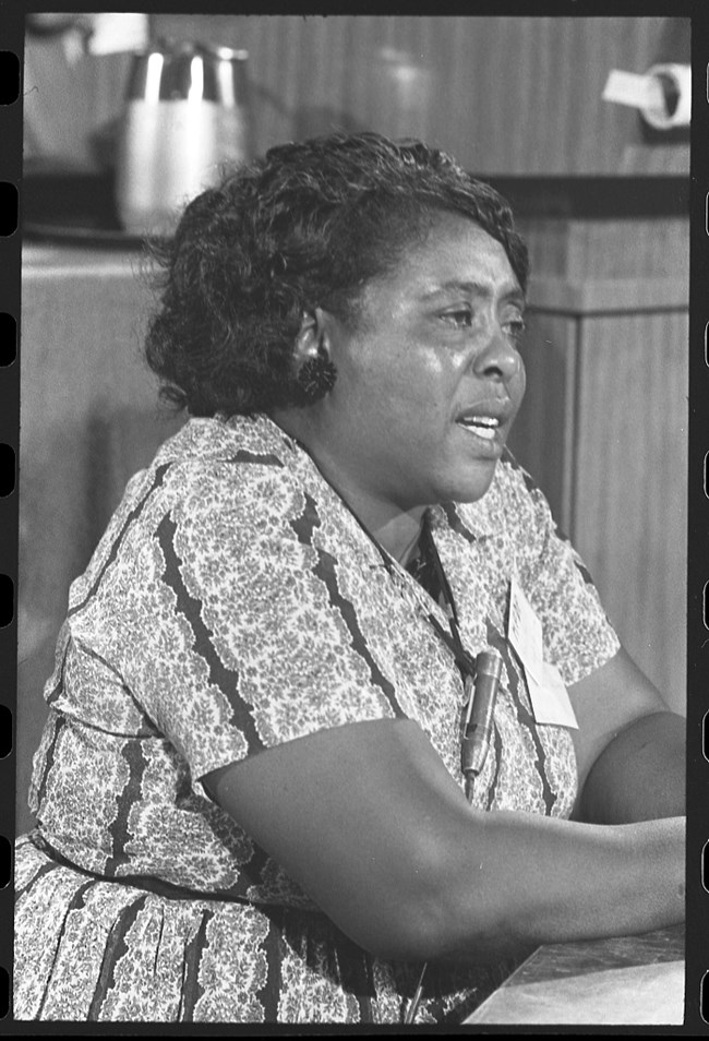 Black and white image of Fannie Lou Hamer speaking