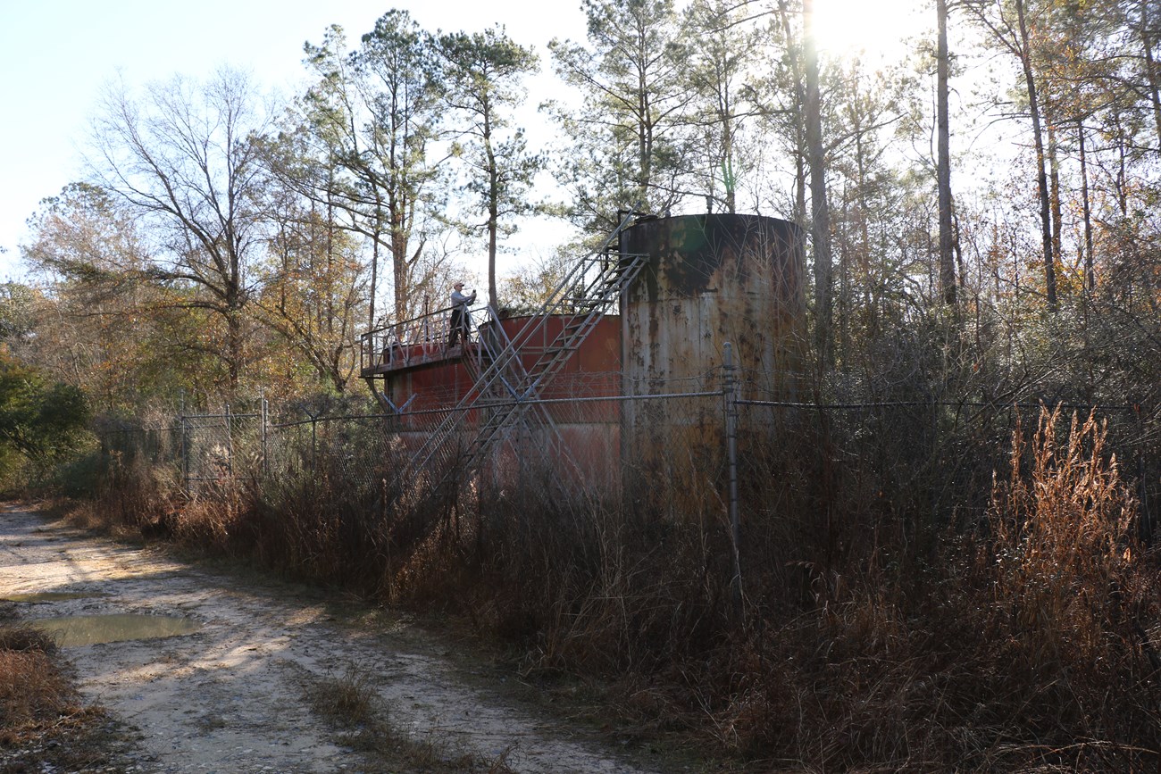 One orphaned well/ production sites to be reclaimed and remediated.  Wellhead is cracked and leaking methane as well as tanks onsite being halfway filled with production fluid.  These conditions create impacts to park resources.  Photos by:  Andrew Bennet